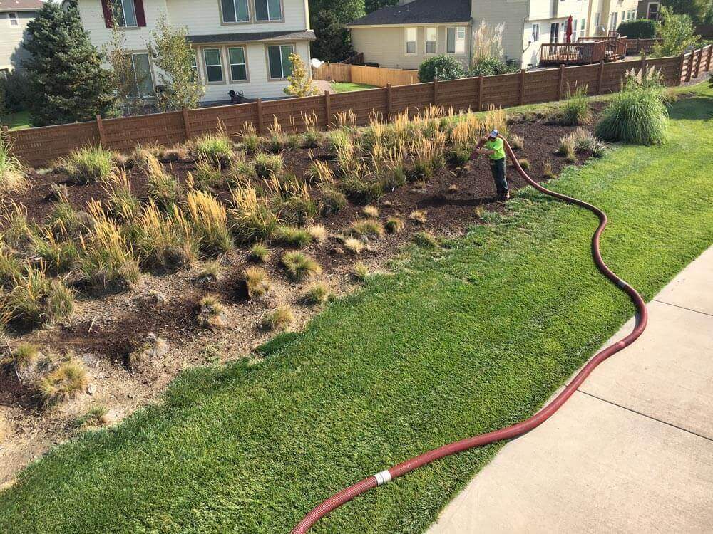 Blower Truck Service for Blownin Mulch from Ground Solutions