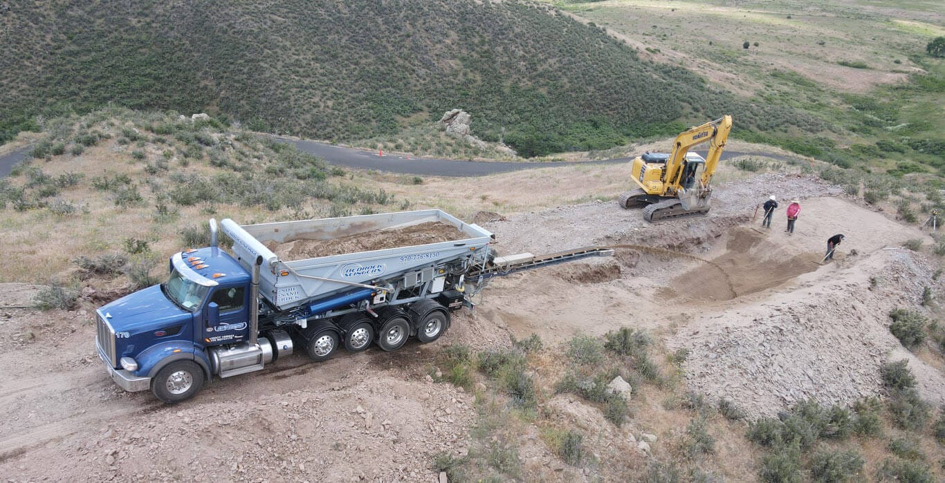 Rock and Gravel Placement using Rock Slinger Trucks Ground Solutions